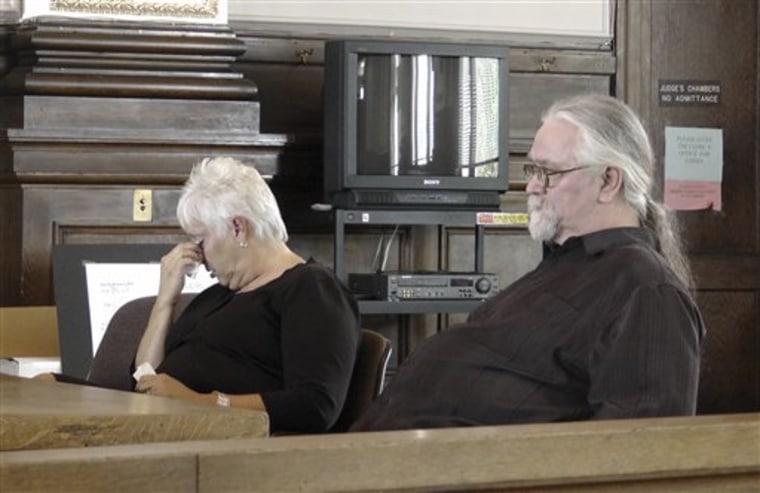 Phillip Seaton, right, and his wife Deborah are shown Monday in the courtroom in Shelbyville, Ky. 
